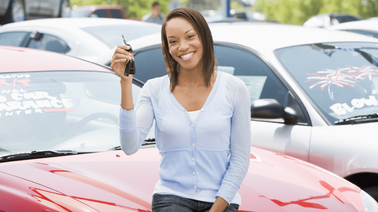 a person in a car posing for the camera